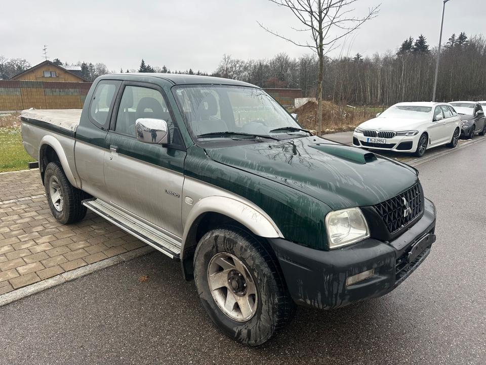 Mitsubishi L200 TD 4x4  пробіг: 229000 рік: Juni 2004 Diesel потужність:116 PS ціна: 5999 - Фото 0