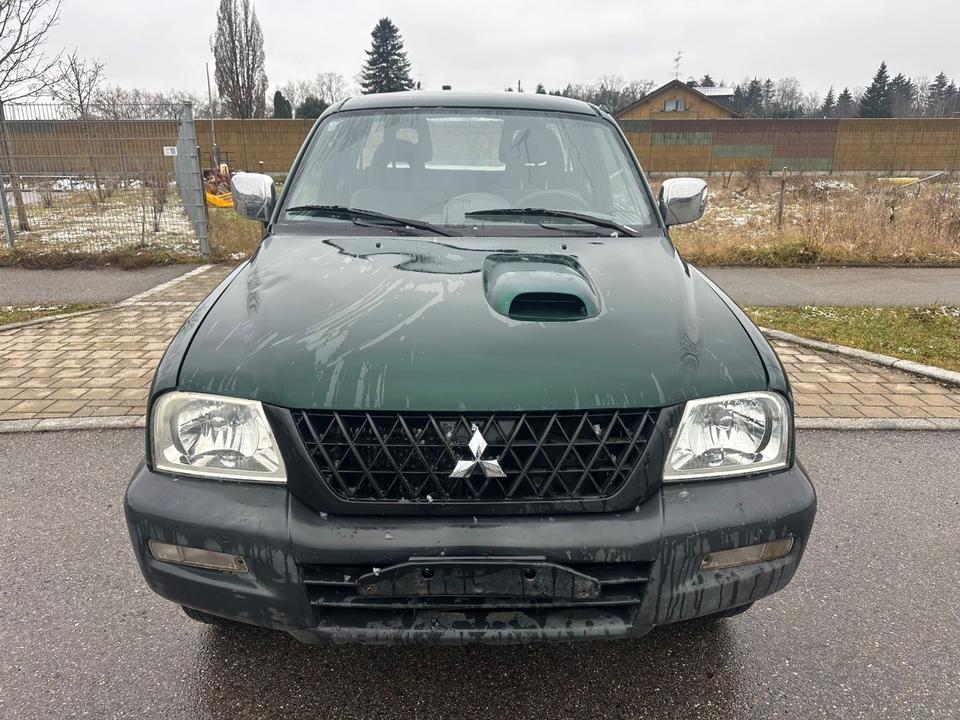 Mitsubishi L200 TD 4x4  пробіг: 229000 рік: Juni 2004 Diesel потужність:116 PS ціна: 5999 - Фото 1