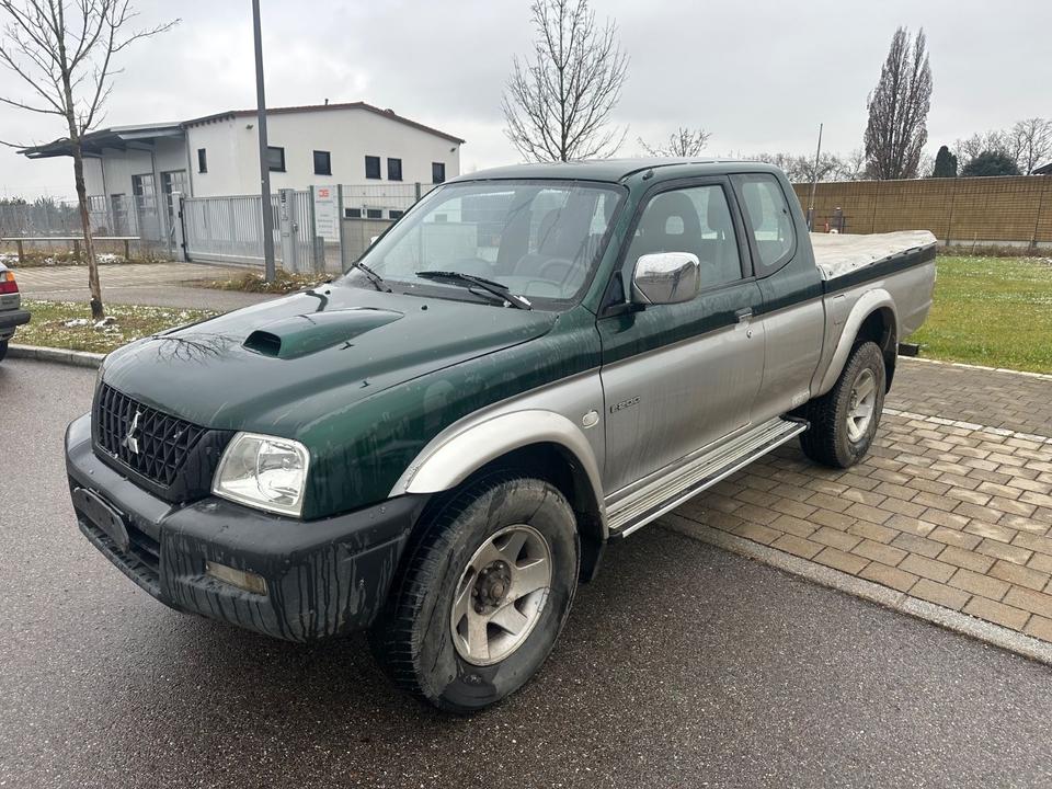 Mitsubishi L200 TD 4x4  пробіг: 229000 рік: Juni 2004 Diesel потужність:116 PS ціна: 5999 - Фото 2