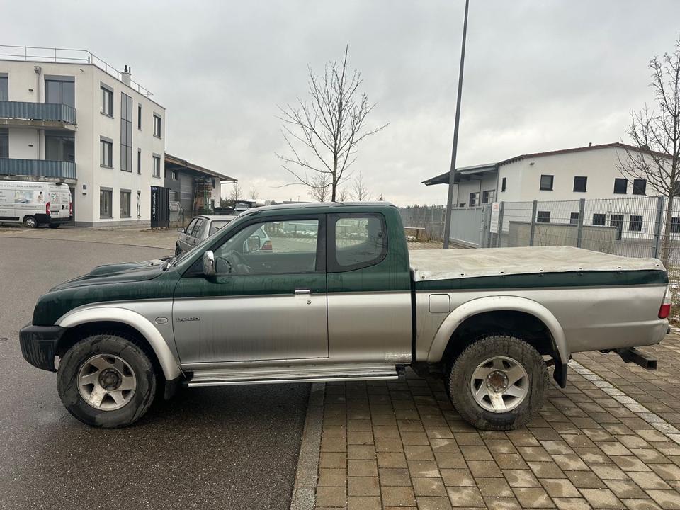 Mitsubishi L200 TD 4x4  пробіг: 229000 рік: Juni 2004 Diesel потужність:116 PS ціна: 5999 - Фото 5