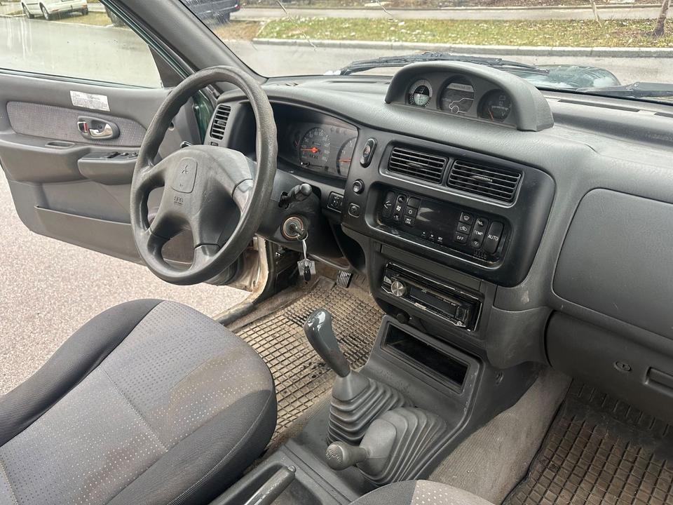 Mitsubishi L200 TD 4x4  пробіг: 229000 рік: Juni 2004 Diesel потужність:116 PS ціна: 5999 - Фото 9