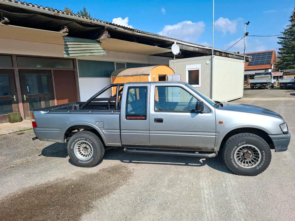 Надійни джип для війсткових Isuzu Opel Campo 3.1 Diesel Pickup 4x4 Sportscap пробіг: 254640 рік: Juli 1999 Diesel потужність:109 PS коробка: Manuell ціна: 4000 - Фото 2