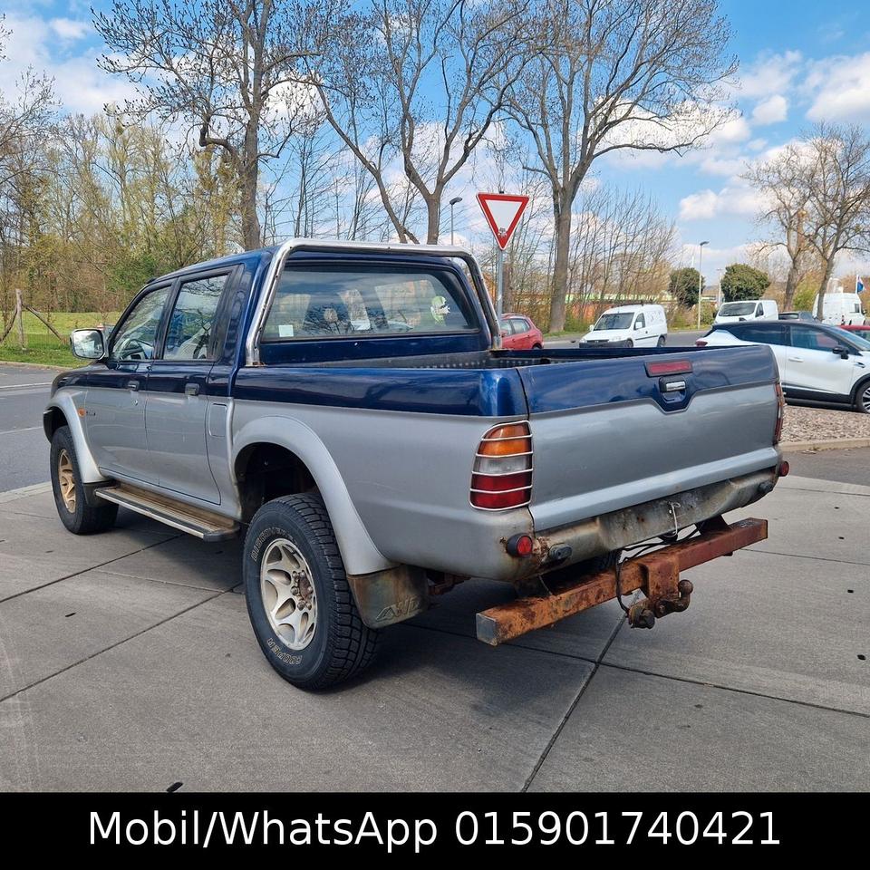 Mitsubishi L200 Magnum 4x4 пробіг: 230650 рік: April 2000 Diesel потужність:99 PS коробка: Manuell ціна: 5999 - Фото 2