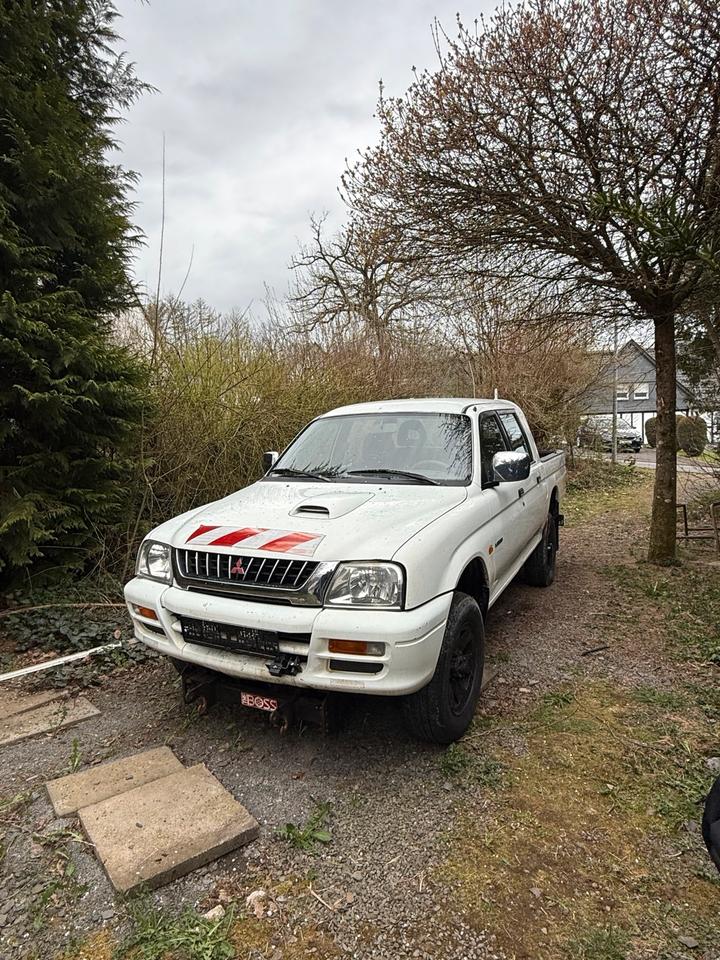 Mitsubishi L200 Pick Up Klima Allrad Doppelkabine пробіг: 177000 рік: März 2001 Diesel потужність:100 PS коробка: Manuell ціна: 5000 - Фото 0