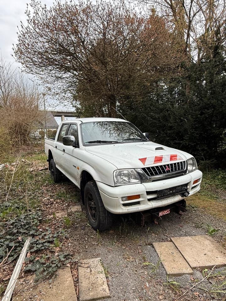 Mitsubishi L200 Pick Up Klima Allrad Doppelkabine пробіг: 177000 рік: März 2001 Diesel потужність:100 PS коробка: Manuell ціна: 5000 - Фото 1