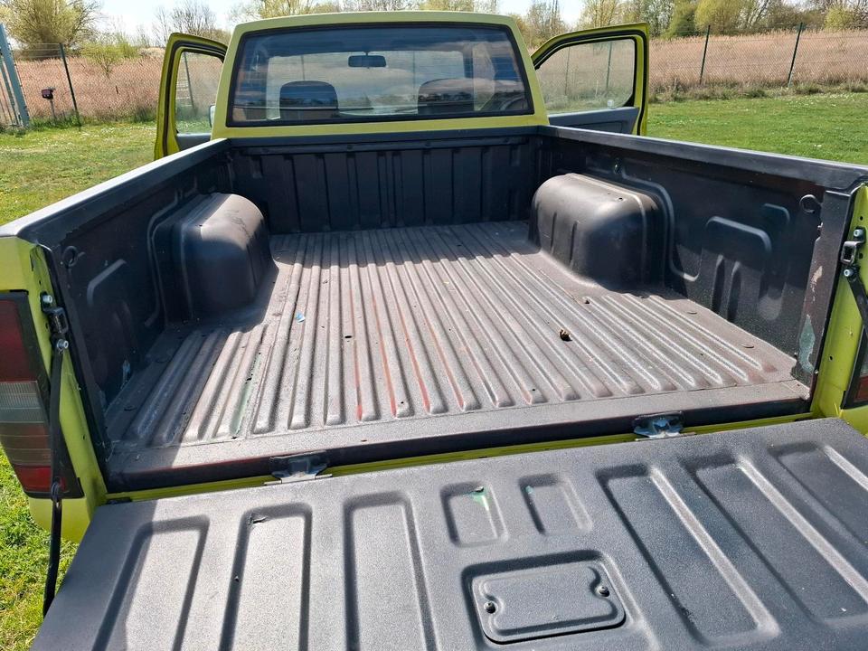  Nissan D22 рік: April 1999 Diesel потужність:103 PS коробка: Manuell ціна: 4300 - Фото 11