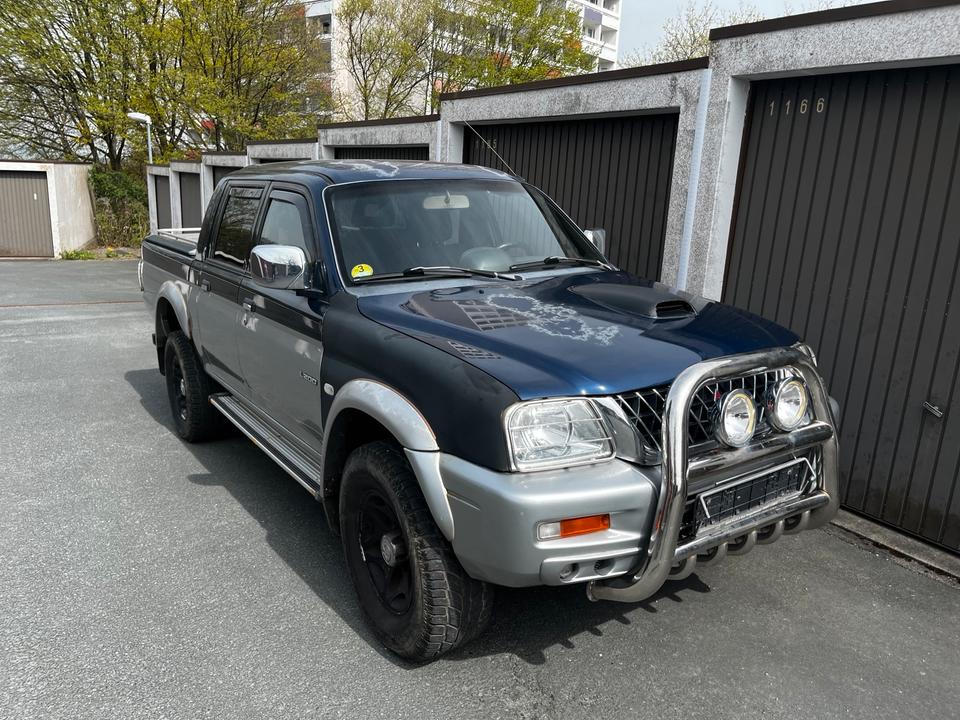 Mitsubishi L200 Pickup пробіг: 226000 рік: April 2004 Diesel потужність:116 PS коробка: Manuell ціна: 5699 - Фото 5