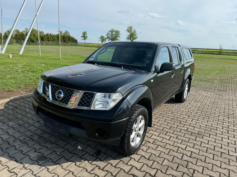 Nissan Navara Pickup Double-Cab Comfort 4X4 Klima пробіг: 240555 рік: August 2005 Diesel потужність:174 PS коробка: Manuell ціна: 4490 - Фото 3