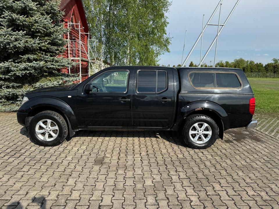 Nissan Navara Pickup Double-Cab Comfort 4X4 Klima пробіг: 240555 рік: August 2005 Diesel потужність:174 PS коробка: Manuell ціна: 4490 - Фото 5