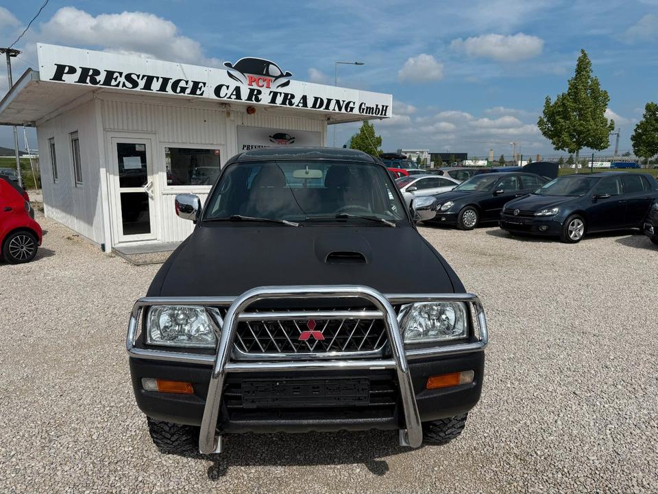 Mitsubishi L200 2.5 TD 4X4 пробіг: 270403 рік: März 2002 Diesel потужність:116 PS коробка: Manuell ціна: 4990 - Фото 1