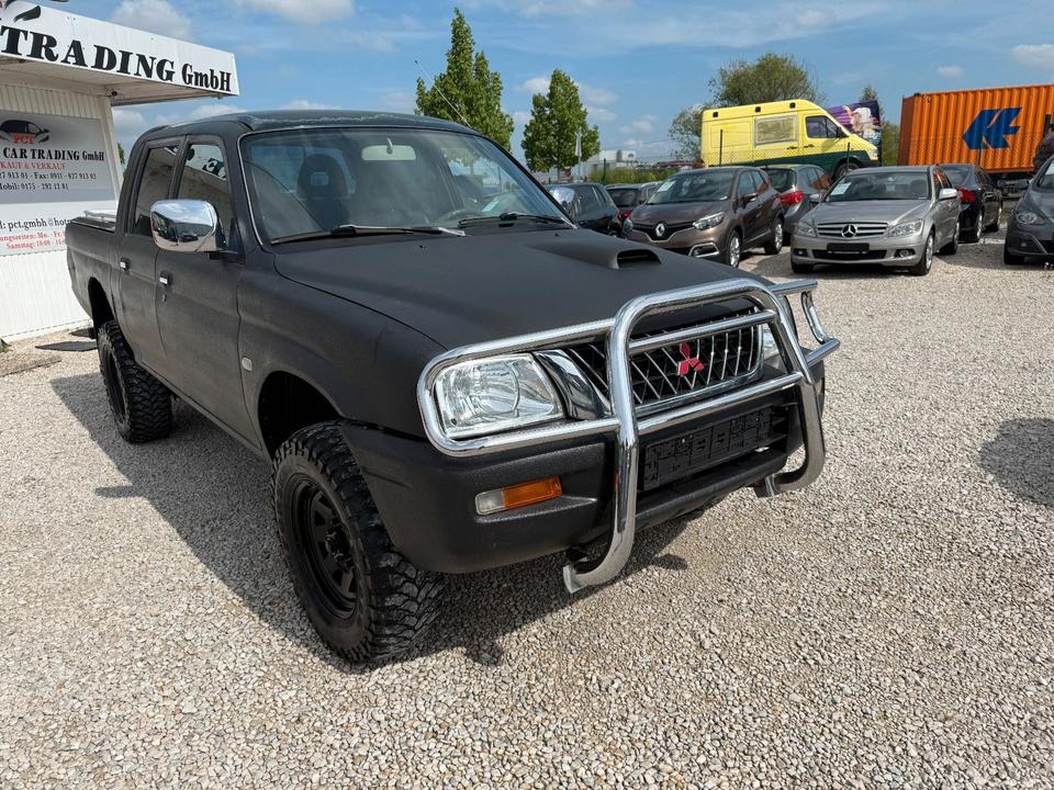 Mitsubishi L200 2.5 TD 4X4 пробіг: 270403 рік: März 2002 Diesel потужність:116 PS коробка: Manuell ціна: 4990 - Фото 2