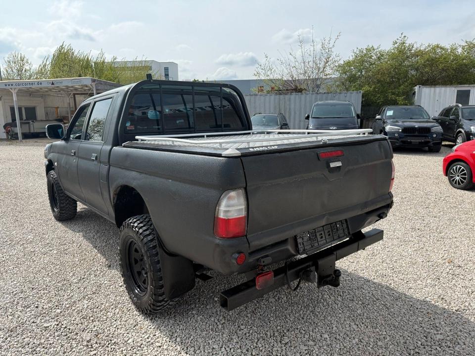 Mitsubishi L200 2.5 TD 4X4 пробіг: 270403 рік: März 2002 Diesel потужність:116 PS коробка: Manuell ціна: 4990 - Фото 3