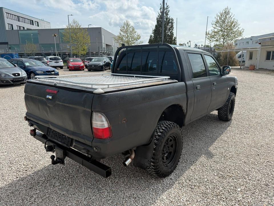Mitsubishi L200 2.5 TD 4X4 пробіг: 270403 рік: März 2002 Diesel потужність:116 PS коробка: Manuell ціна: 4990 - Фото 5