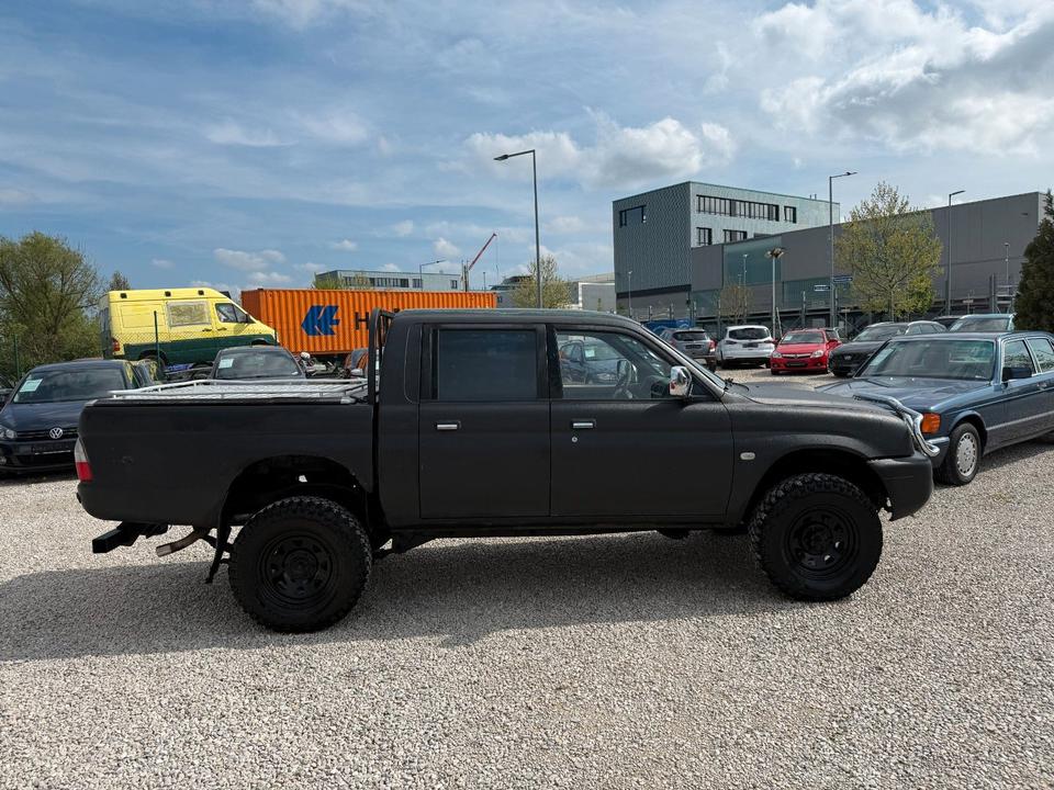 Mitsubishi L200 2.5 TD 4X4 пробіг: 270403 рік: März 2002 Diesel потужність:116 PS коробка: Manuell ціна: 4990 - Фото 7