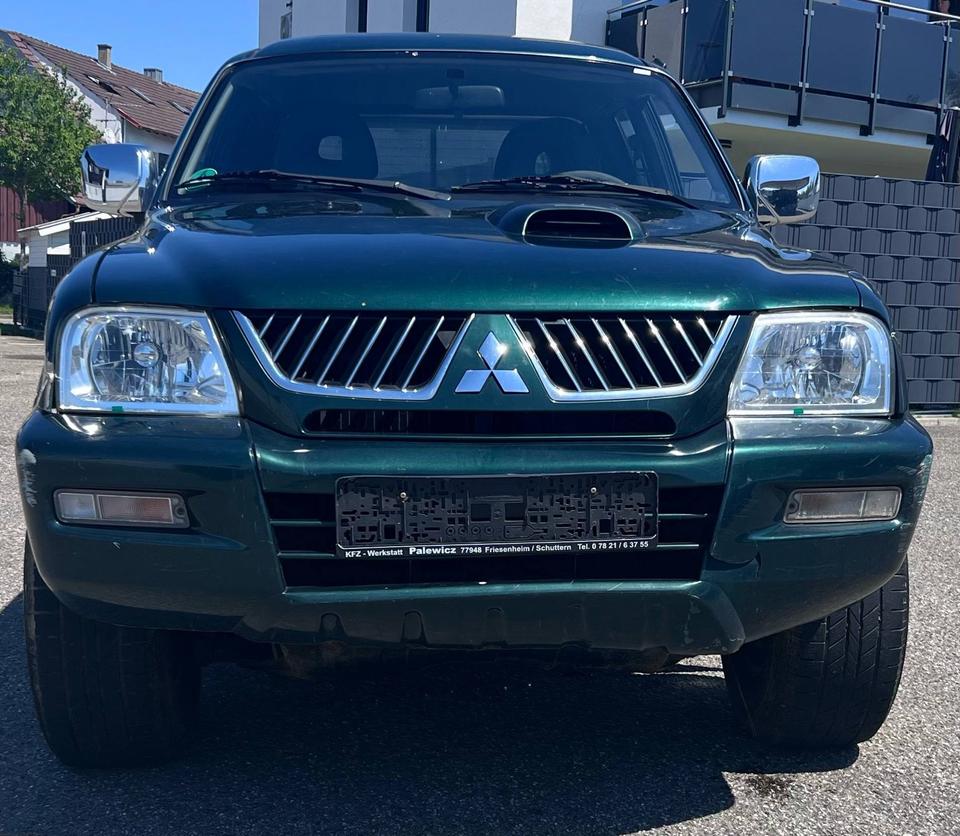 Купити авто для ЗСУ Mitsubishi L200  4x4 пробіг: 230000 рік: Oktober 2005 потужність:116 PS коробка: Manuell ціна: 5300 - Фото 0