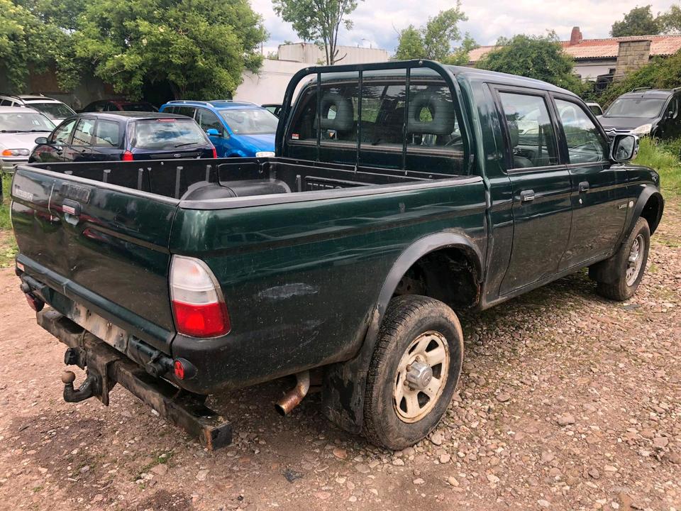 Mitsubishi L200 PickUp 4x4 пробіг: 241785 рік: Juni 2003 Diesel потужність:115 PS коробка: Manuell ціна: 5499 - Фото 2