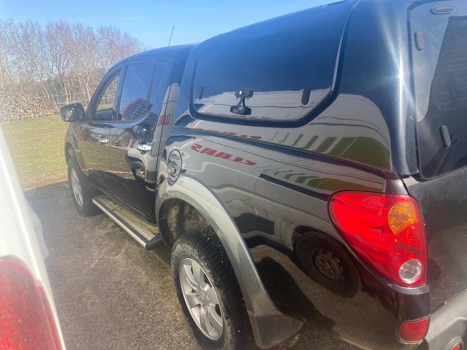 Авто за Европи на передову Mitsubishi L200 Doppelkabine  пробіг: 142879 рік: September 2006 Diesel потужність:136 PS коробка: Manuell ціна: 5700 Schwarz - Фото 1