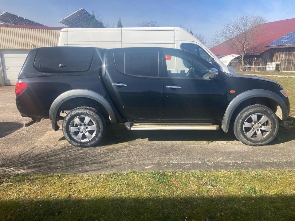 Авто за Европи на передову Mitsubishi L200 Doppelkabine  пробіг: 142879 рік: September 2006 Diesel потужність:136 PS коробка: Manuell ціна: 5700 Schwarz - Фото 2