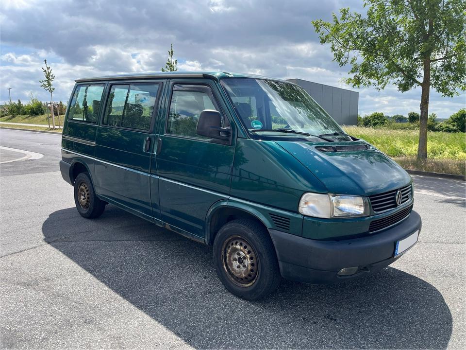 Бус купити пригнати з Европи VW T4 2.5 TDI Multivan пробіг: 476570 рік: März 1998 Diesel потужність:102 PS коробка: Manuell ціна: 4000 Grün - Фото 0