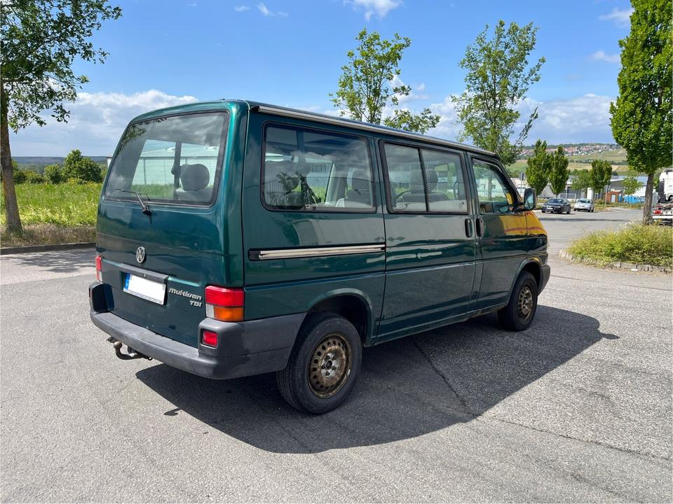 Бус купити пригнати з Европи VW T4 2.5 TDI Multivan пробіг: 476570 рік: März 1998 Diesel потужність:102 PS коробка: Manuell ціна: 4000 Grün - Фото 1