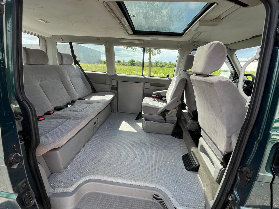 Бус купити пригнати з Европи VW T4 2.5 TDI Multivan пробіг: 476570 рік: März 1998 Diesel потужність:102 PS коробка: Manuell ціна: 4000 Grün - Фото 10