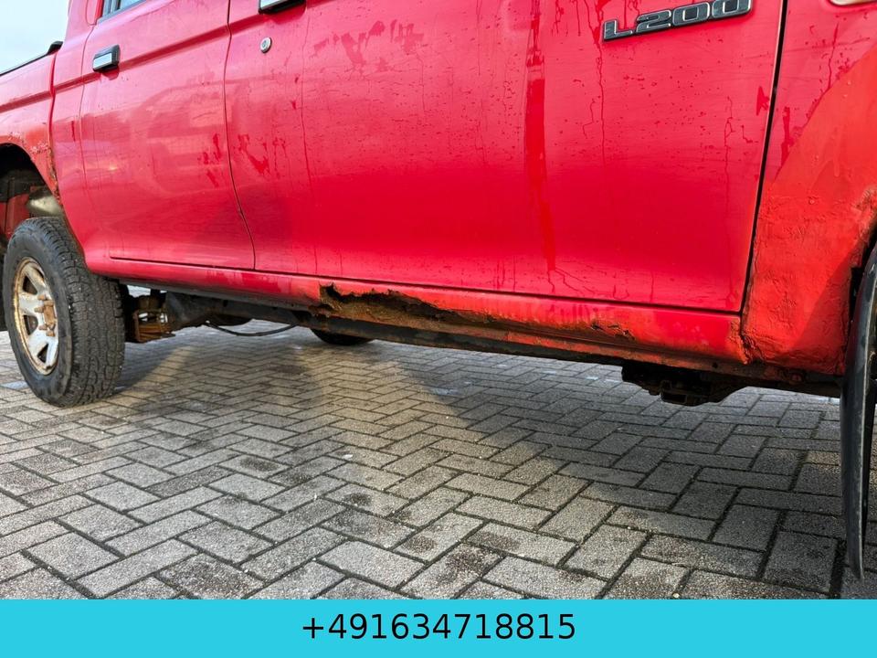 Mitsubishi L200 Allrad Klima пробіг: 270000 рік: April 2005 Diesel потужність:116 PS коробка: Manuell ціна: 4900 - Фото 14