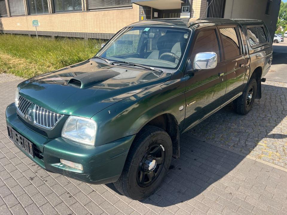 Купити потужне  авто з ЄвропиMitsubishi L200 2.5 TD  пробіг: 330000 рік: Dezember 2005 Diesel потужність:116 PS коробка: Manuell ціна: 5750 - Фото 0