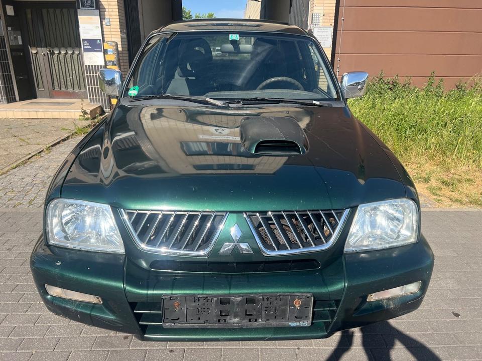 Купити потужне  авто з ЄвропиMitsubishi L200 2.5 TD  пробіг: 330000 рік: Dezember 2005 Diesel потужність:116 PS коробка: Manuell ціна: 5750 - Фото 1