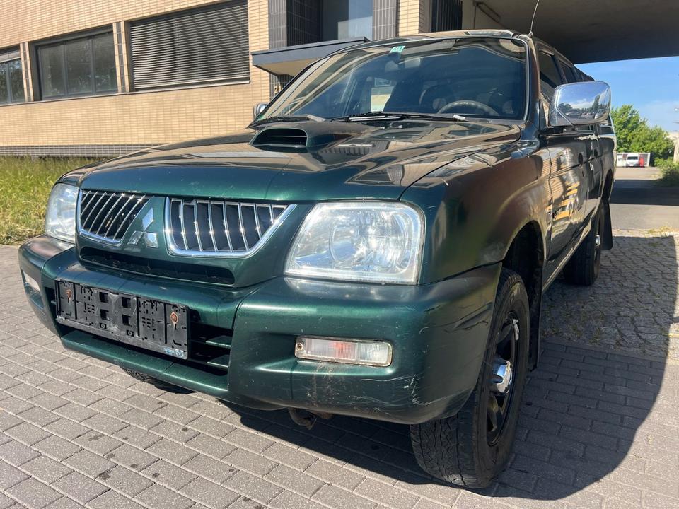 Купити потужне  авто з ЄвропиMitsubishi L200 2.5 TD  пробіг: 330000 рік: Dezember 2005 Diesel потужність:116 PS коробка: Manuell ціна: 5750 - Фото 3