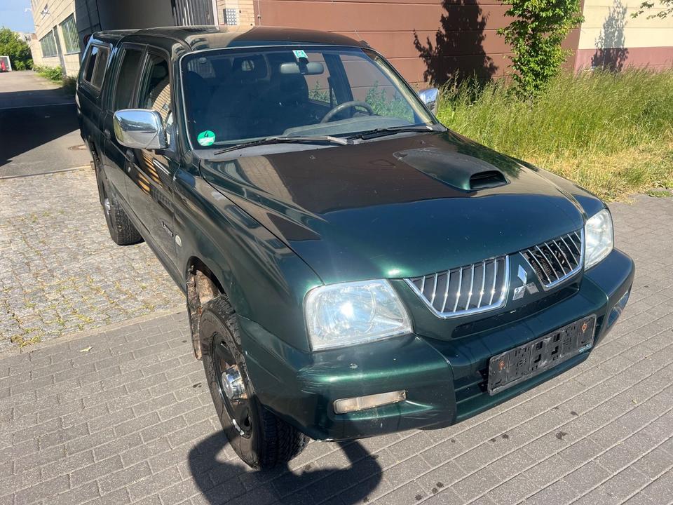 Купити потужне  авто з ЄвропиMitsubishi L200 2.5 TD  пробіг: 330000 рік: Dezember 2005 Diesel потужність:116 PS коробка: Manuell ціна: 5750 - Фото 4