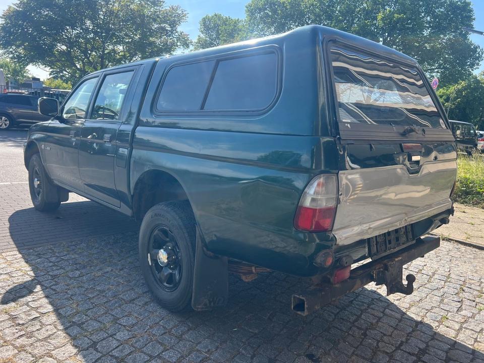 Купити потужне  авто з ЄвропиMitsubishi L200 2.5 TD  пробіг: 330000 рік: Dezember 2005 Diesel потужність:116 PS коробка: Manuell ціна: 5750 - Фото 6