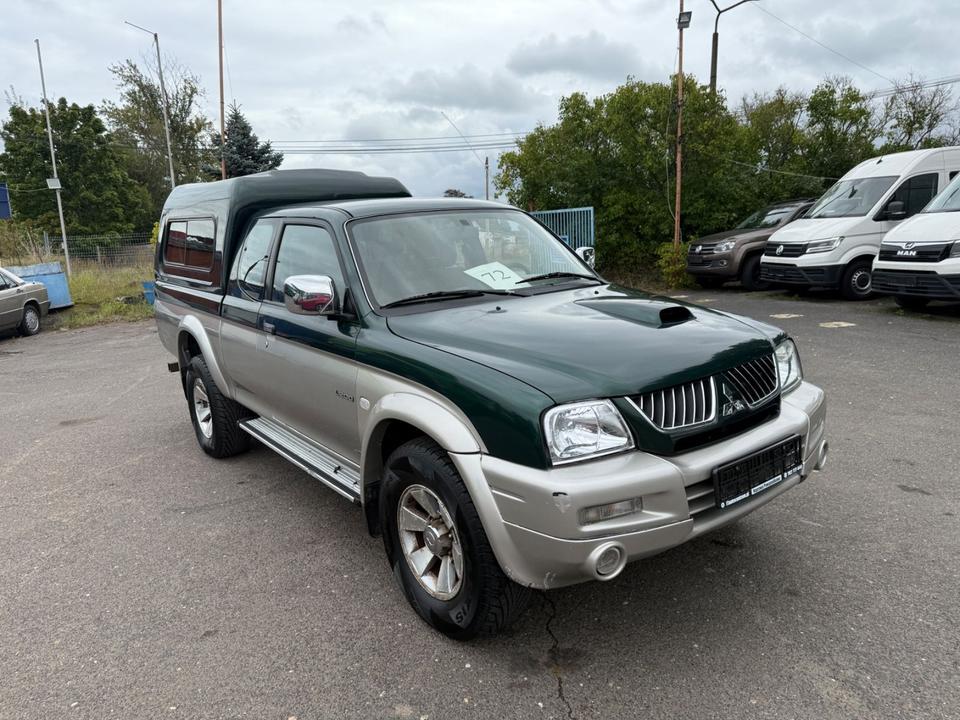 Купити якісне авто з ЄвропиMitsubishi L200 Magnum  TD Intense Club Cab 2500  пробіг: 210579 рік: Dezember 2005 Diesel потужність:116 PS коробка: Manuell ціна: 5990 - Фото 1