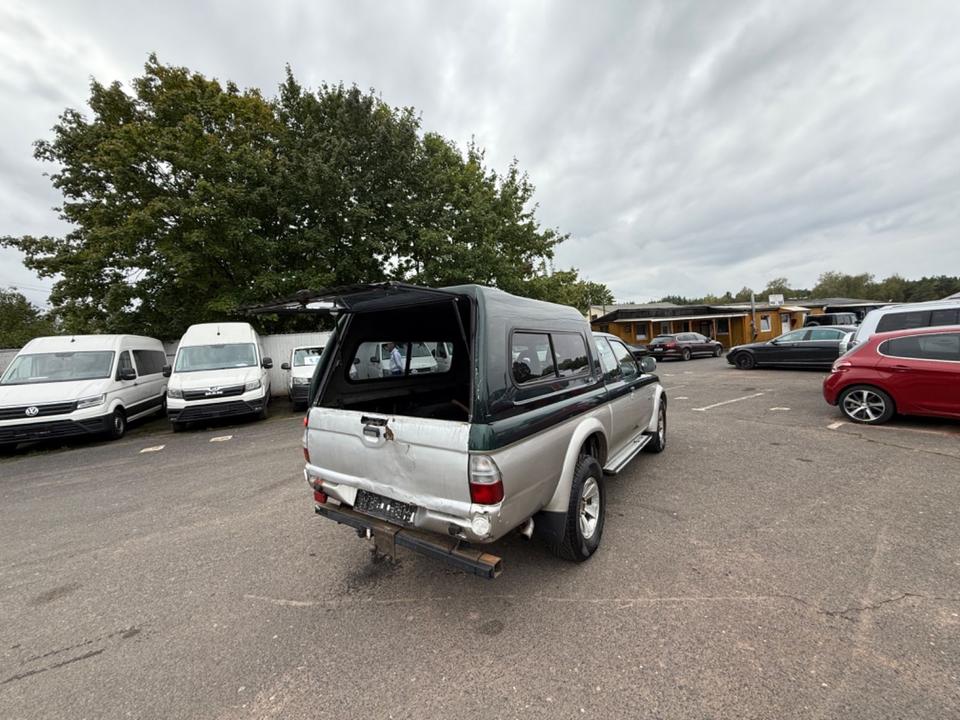 Купити якісне авто з ЄвропиMitsubishi L200 Magnum  TD Intense Club Cab 2500  пробіг: 210579 рік: Dezember 2005 Diesel потужність:116 PS коробка: Manuell ціна: 5990 - Фото 6