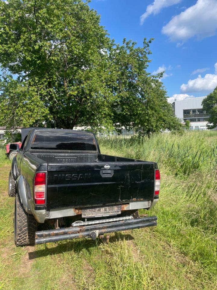 Nissan Navara D22 KingCab Pickup пробіг: 180000 рік: Juli 2000 Diesel потужність:103 PS коробка: Manuell ціна: 4999 Schwarz - Фото 9