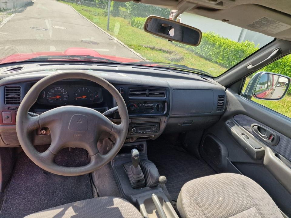 Mitsubishi L200 пробіг: 253000 рік: August 2003 Diesel потужність:116 PS коробка: Manuell ціна: 4999 Rot - Фото 11