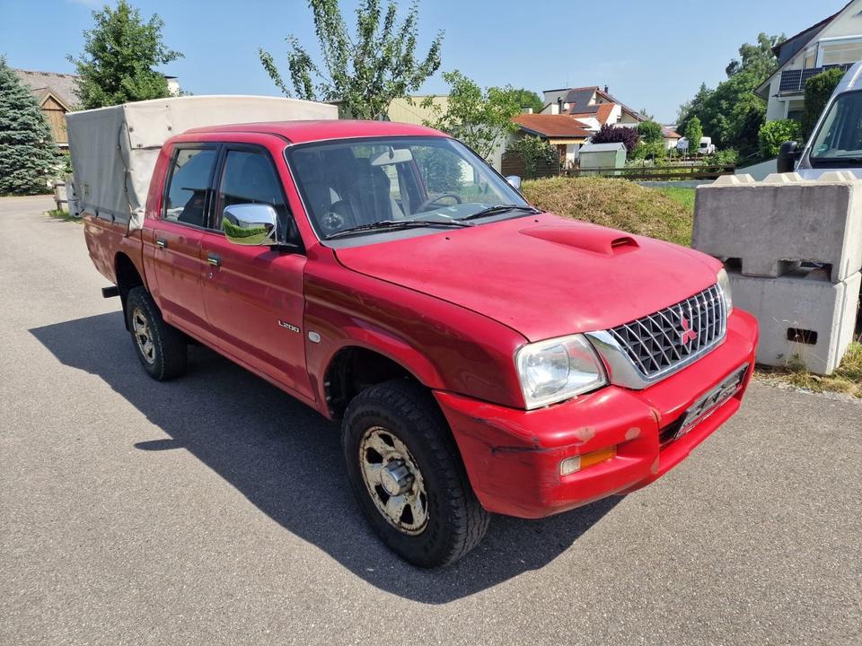 Mitsubishi L200 пробіг: 253000 рік: August 2003 Diesel потужність:116 PS коробка: Manuell ціна: 4999 Rot - Фото 2