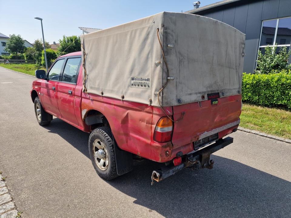 Mitsubishi L200 пробіг: 253000 рік: August 2003 Diesel потужність:116 PS коробка: Manuell ціна: 4999 Rot - Фото 3