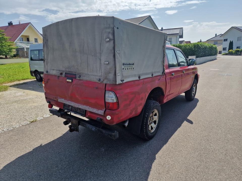 Mitsubishi L200 пробіг: 253000 рік: August 2003 Diesel потужність:116 PS коробка: Manuell ціна: 4999 Rot - Фото 4