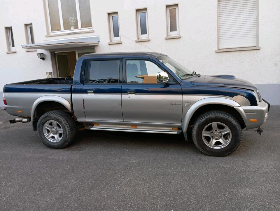 Mitsubishi L 200 Pickup пробіг: 298000 рік: Januar 2003 Diesel потужність:116 PS коробка: Manuell ціна: 3999 - Фото 1