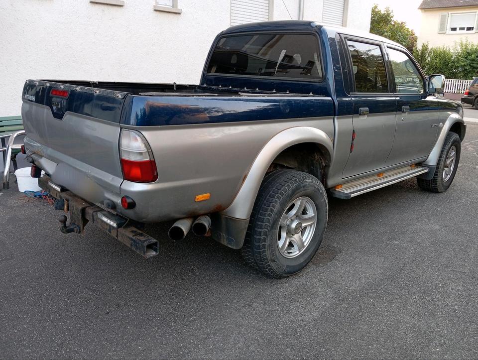 Mitsubishi L 200 Pickup пробіг: 298000 рік: Januar 2003 Diesel потужність:116 PS коробка: Manuell ціна: 3999 - Фото 2
