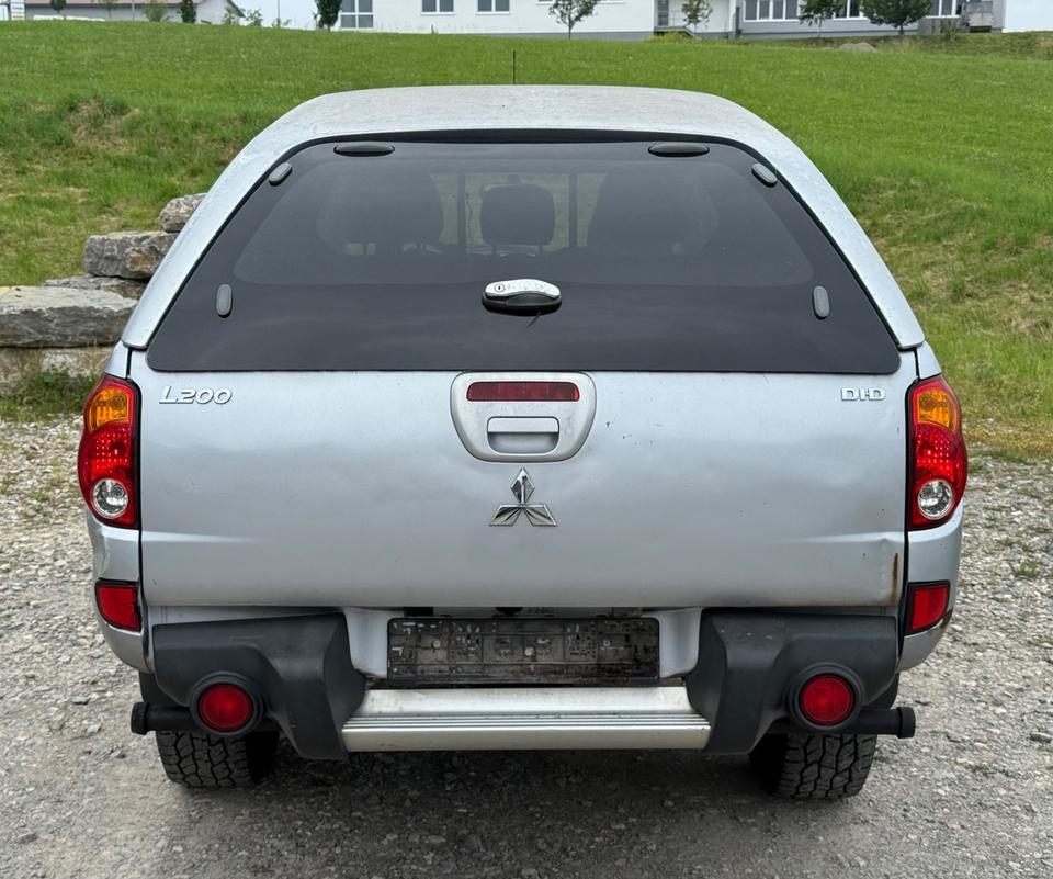 Mitsubishi L200 Pick-Up Double Cab 2.5 D-ID 4WD Intense пробіг: 301000 рік: August 2006 Diesel потужність:136 PS SUV/Geländewagen ціна: 5950 - Фото 2