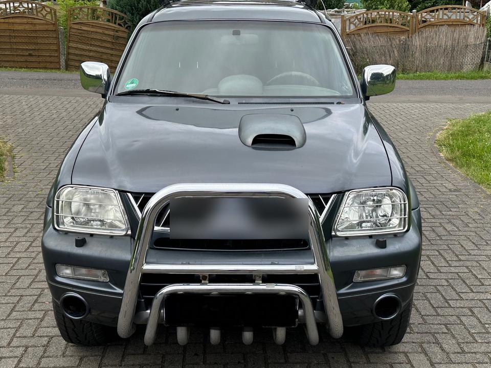 Mitsubishi L200 2.5 Dakar пробіг: 176000 рік: Juli 2005 Diesel коробка: Manuell ціна: 5700 Grau - Фото 2