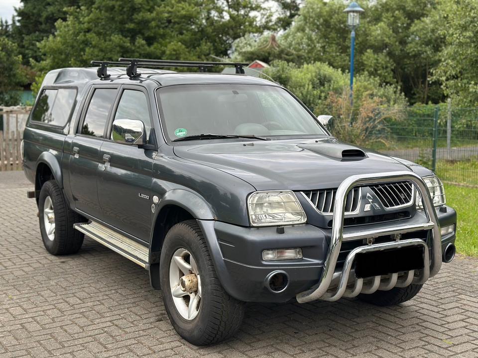 Mitsubishi L200 2.5 Dakar пробіг: 176000 рік: Juli 2005 Diesel коробка: Manuell ціна: 5700 Grau - Фото 3