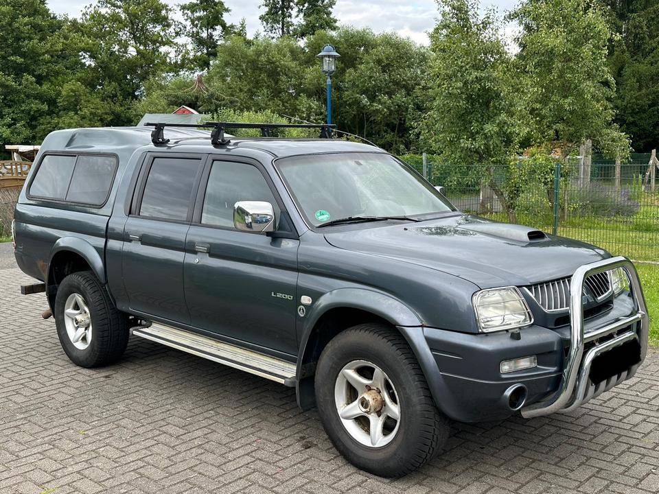 Mitsubishi L200 2.5 Dakar пробіг: 176000 рік: Juli 2005 Diesel коробка: Manuell ціна: 5700 Grau - Фото 4