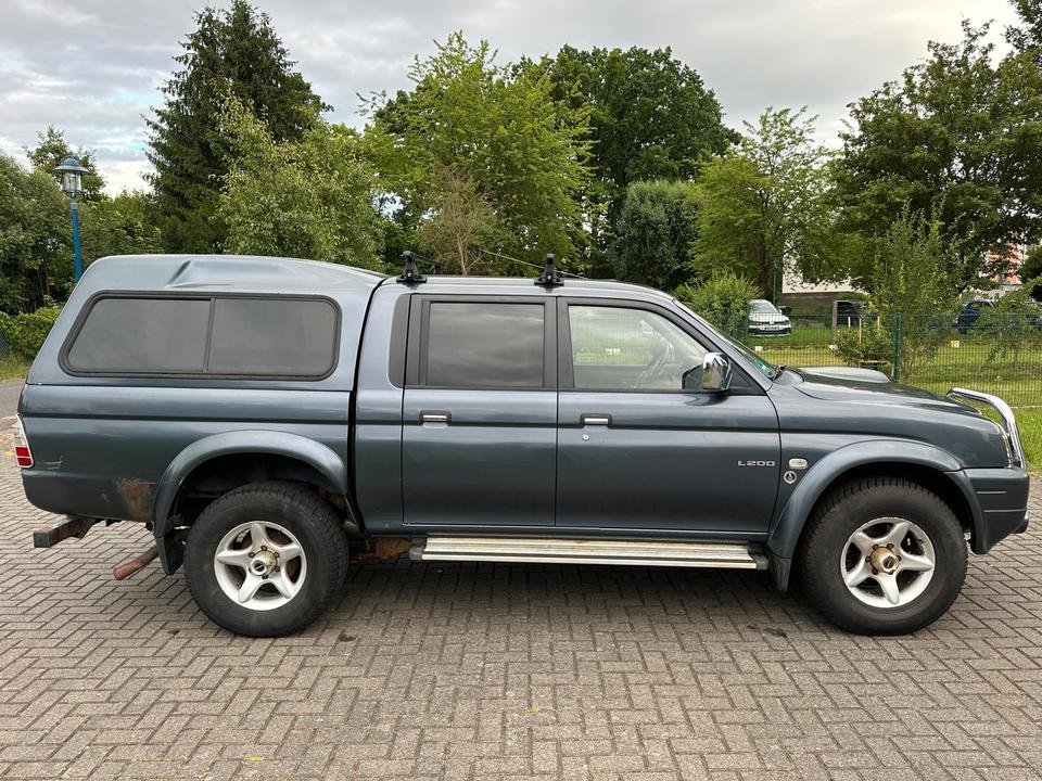 Mitsubishi L200 2.5 Dakar пробіг: 176000 рік: Juli 2005 Diesel коробка: Manuell ціна: 5700 Grau - Фото 5