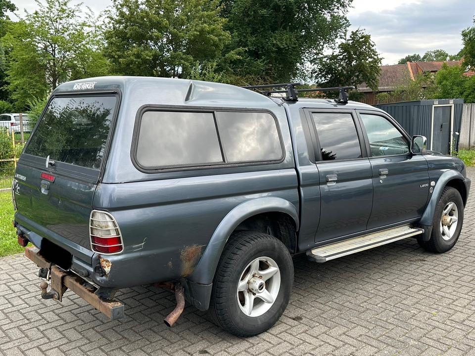 Mitsubishi L200 2.5 Dakar пробіг: 176000 рік: Juli 2005 Diesel коробка: Manuell ціна: 5700 Grau - Фото 6