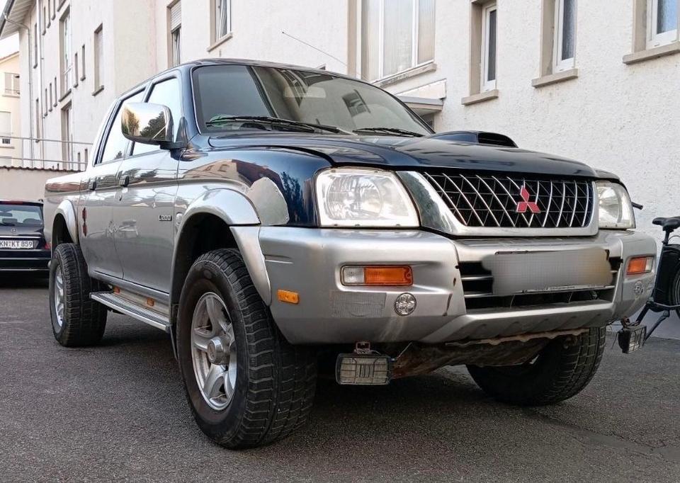 Надійне авто для ЗСУ Mitsubishi L200 Doppelkabine Pickup пробіг: 298000 рік: April 2003 Diesel потужність:117 PS коробка: Manuell ціна: 4499 - Фото 0