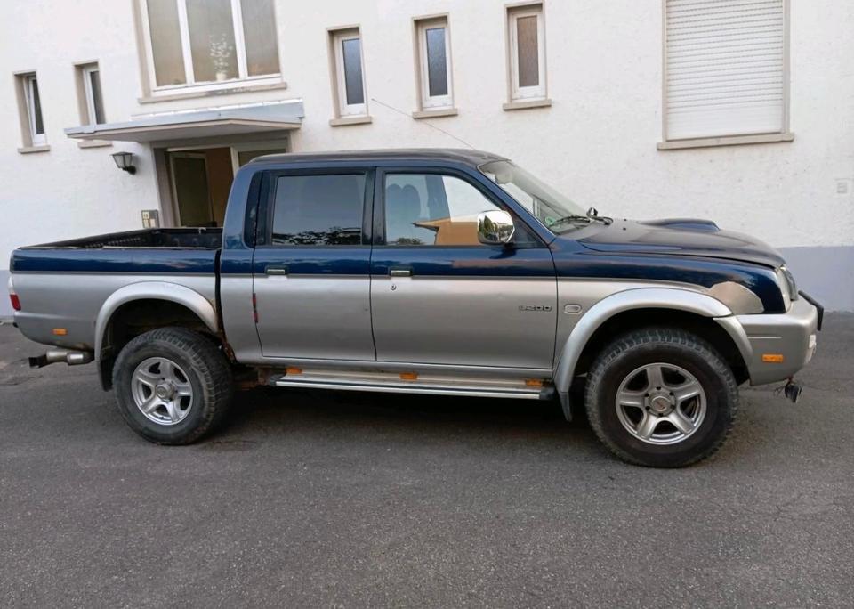 Надійне авто для ЗСУ Mitsubishi L200 Doppelkabine Pickup пробіг: 298000 рік: April 2003 Diesel потужність:117 PS коробка: Manuell ціна: 4499 - Фото 1