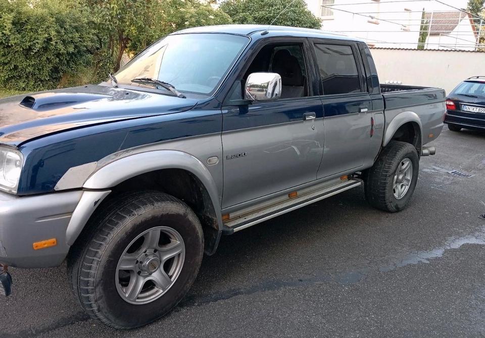 Надійне авто для ЗСУ Mitsubishi L200 Doppelkabine Pickup пробіг: 298000 рік: April 2003 Diesel потужність:117 PS коробка: Manuell ціна: 4499 - Фото 5