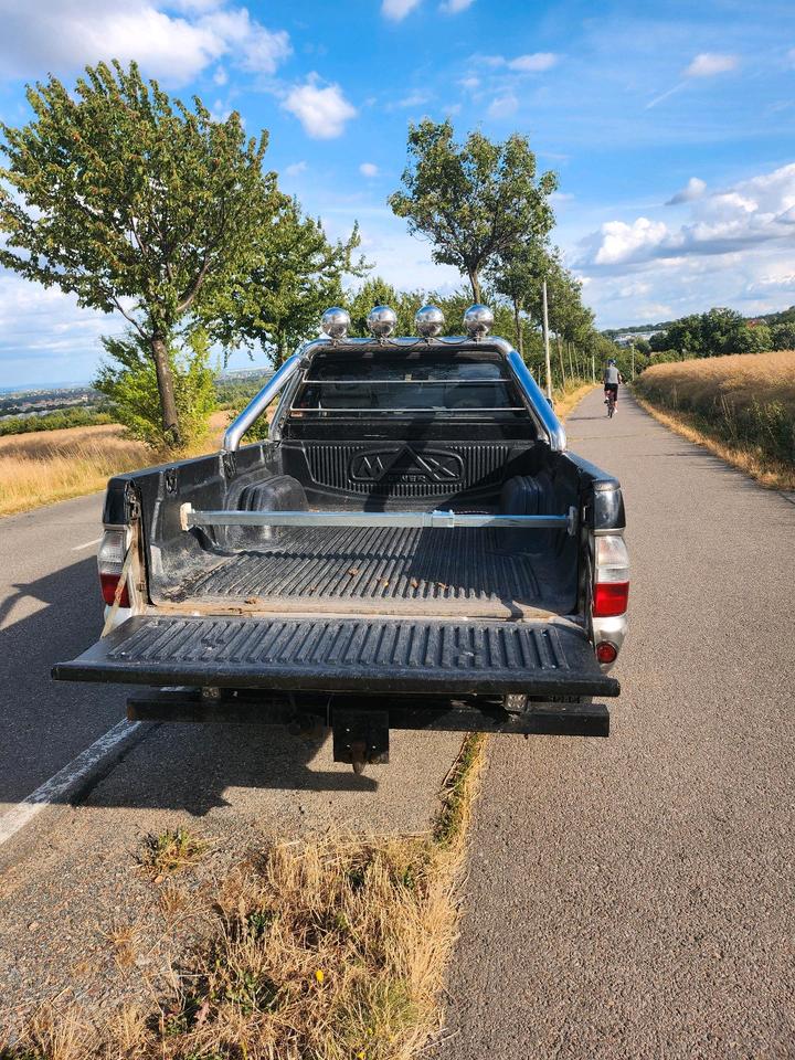 Mitsubishi L200 пробіг: 194000 рік: März 2004 Diesel потужність:116 PS коробка: Manuell ціна: 6000 - Фото 2
